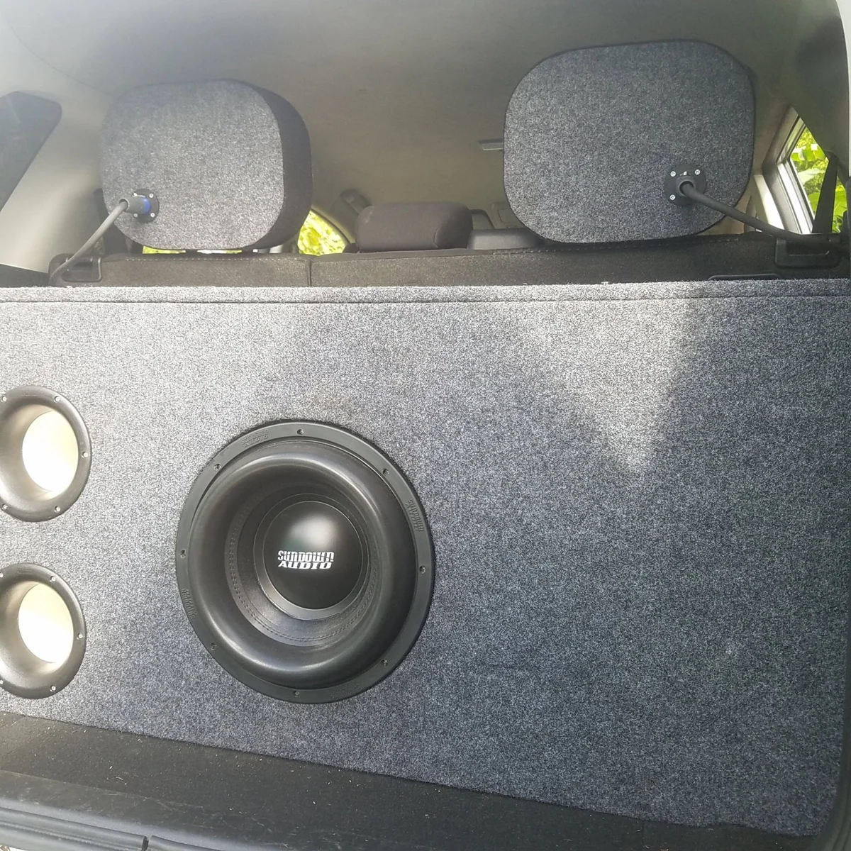 Subwoofer in carpeted enclosure